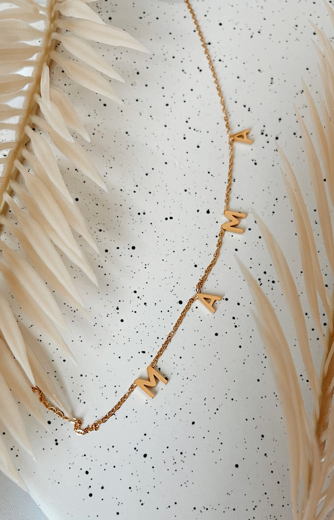 dainty mama necklace in 18k gold